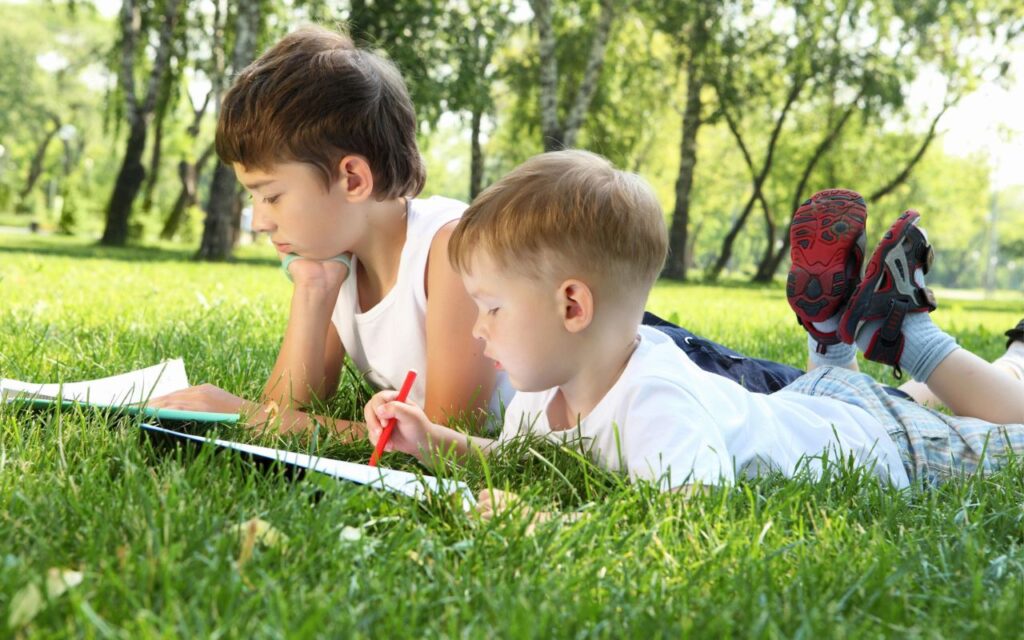 boys coloring outside