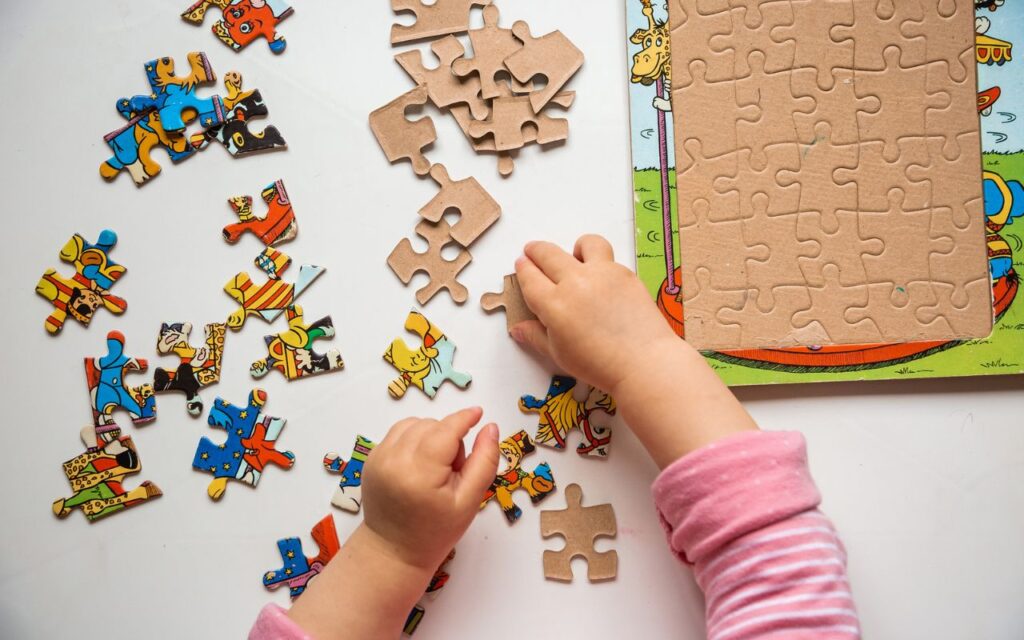 toddler doing a puzzle