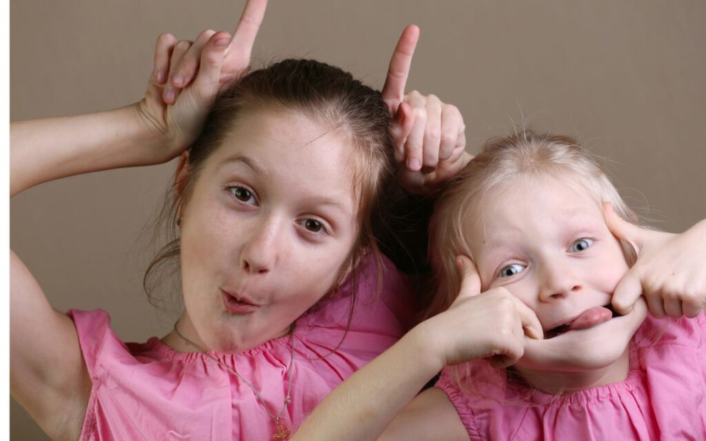 girls making silly faces