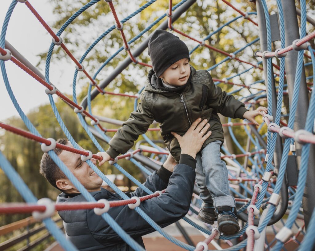 child playing and balancing on the playground