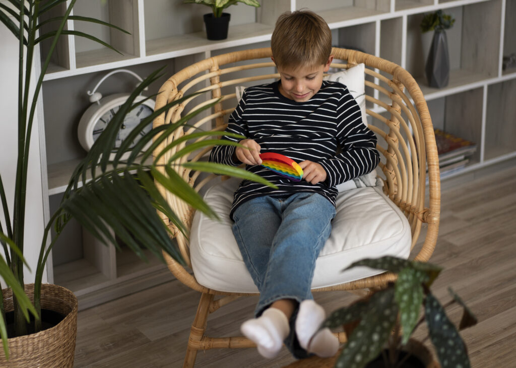 Sensory-Based Approaches for Improving Executive Function Skills in Kids 6 kids playing with pop it